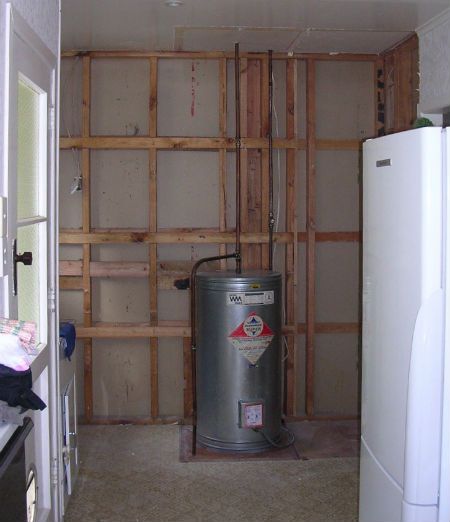 Laundry storage solution under construction at a home in Thames