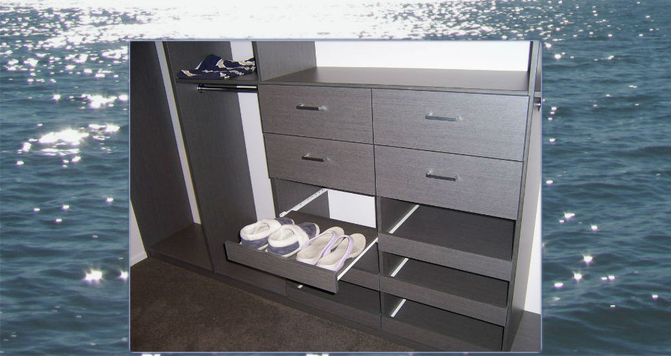 Pull-out shoe shelves in a wardrobe
